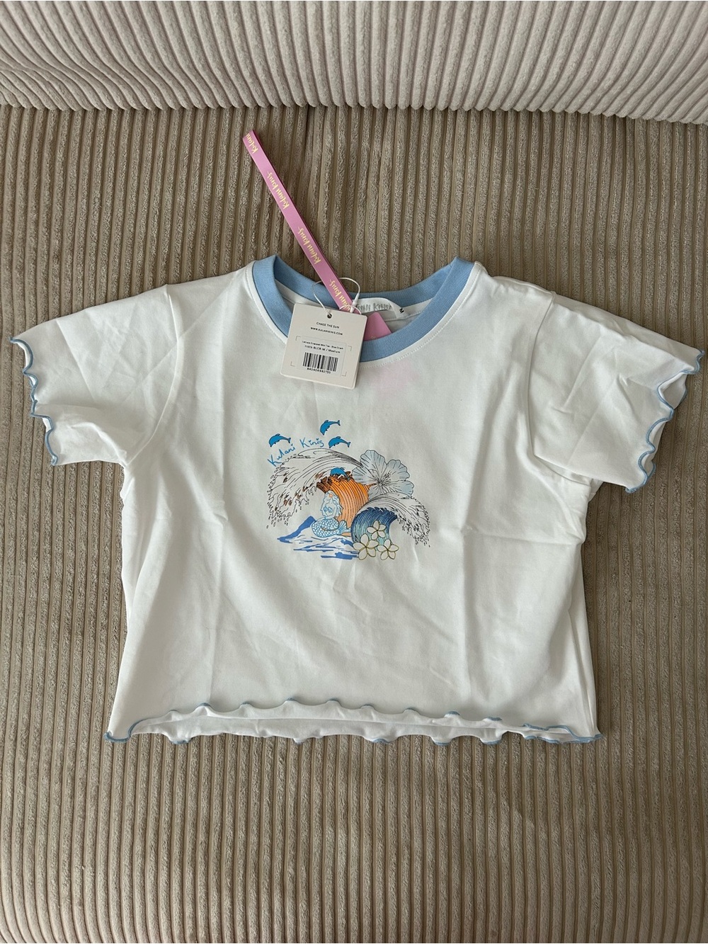 Kulani Kinis White Tee with Light Blue Trim and Ocean Graphic
